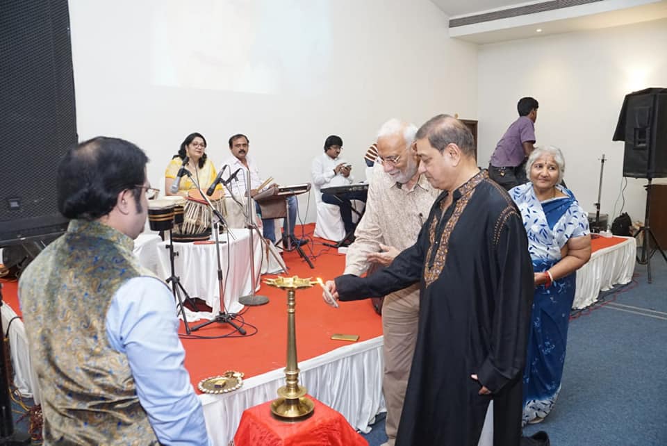 Social Worker and Industrialist Shri Vilas Kale lighting the lamp during a musical program